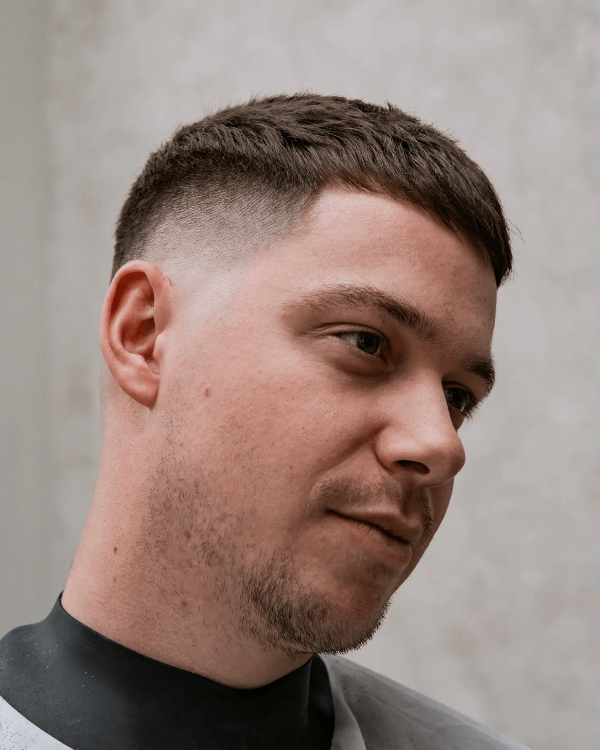 Best 16 Low Taper Fade with Textured Fringe Hairstyle - Taper Haircuts